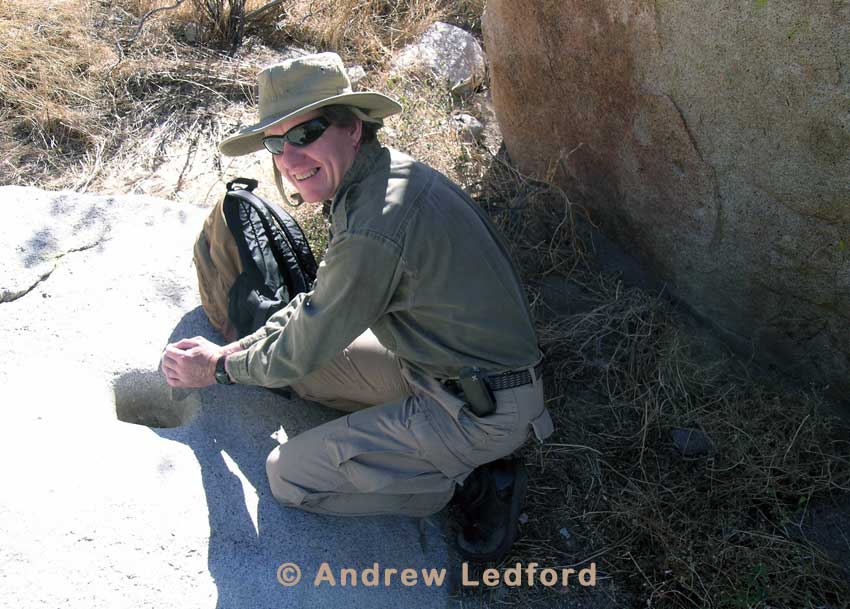 Me with Indian Grinding Stone in the California desert